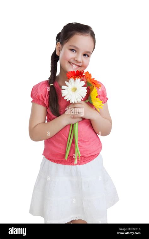 girl holding flowers stock photo alamy