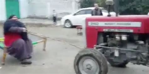 pakistani “hulk man” arbab khizer hayat pulls tractor with his bare