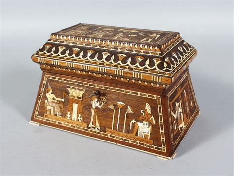 egyptian revival sarcophagus shaped casket  inlaid decoration