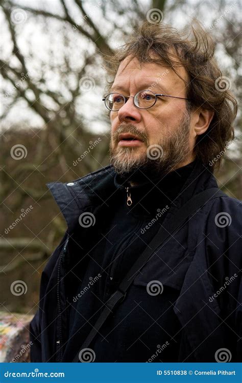 man stock photo image  coat standing concentrative