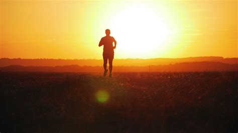 silhouette  runner  beautiful sunset stock footage sbv  storyblocks