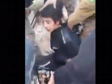 video claims to show a nine year old isis supporter being executed by