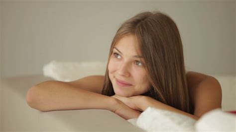 Charming Girl Relaxing On Sofa Looking At Stock Footage Sbv 303976134