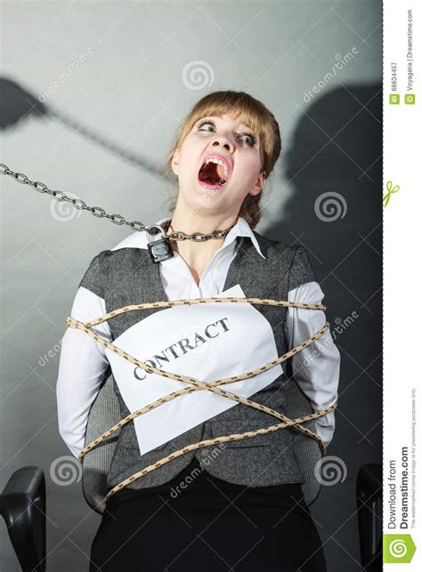 upset businesswoman bound by contract terms stock image