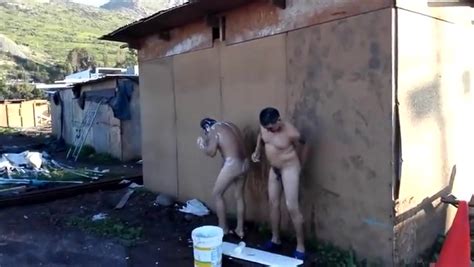 Outdoor Shower Of Mature Men