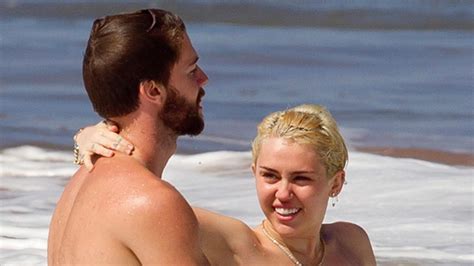 Miley Cyrus Goes Topless On Vacation With Patrick