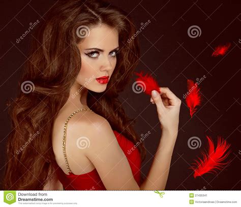 woman with beauty long curly brown hair stock image