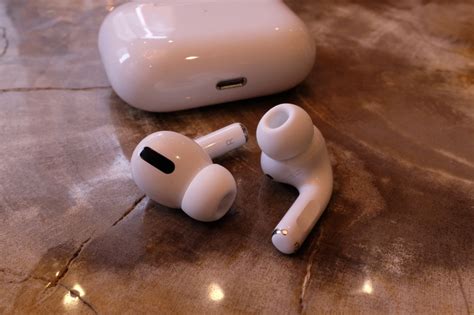 apples airpods pro set  pricey  standard  earbuds