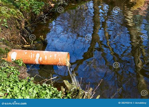 industrial pipe dumping waste water stock photo image  pouring