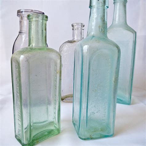 antique glass bottles lot   vintage mixed bottles