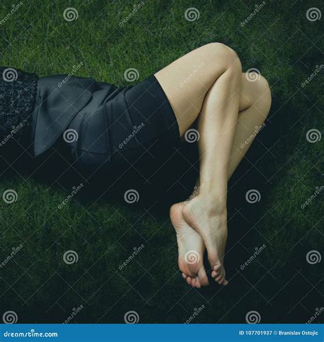 Barefoot Woman In Black Dress Lie On Grass Stock Image Image Of Girly