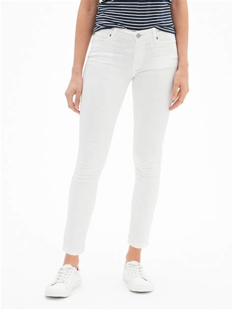 gap factory denim mid rise legging skimmer jeans in white save 15 lyst