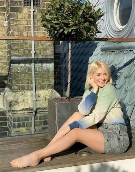 Holly Willoughby Flashes Legs As She Soaks Up Sun In Tiny Camouflage