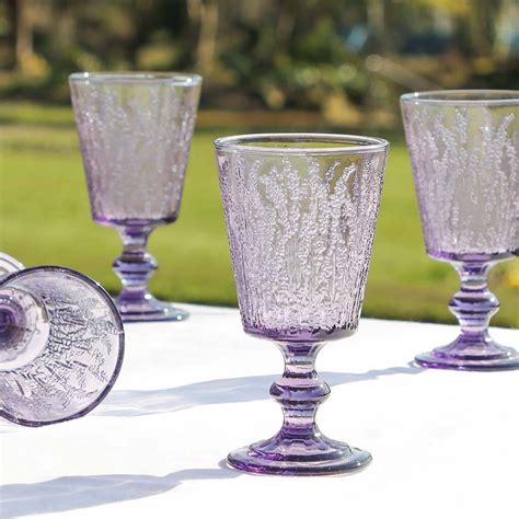 set of four vintage embossed coloured wine glasses by