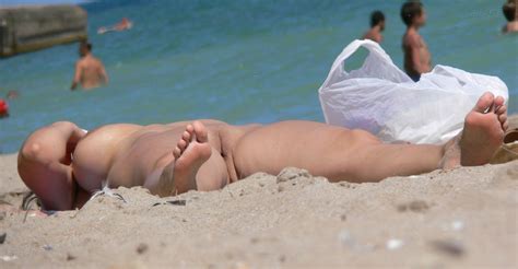 legs spread at nude beach cumception