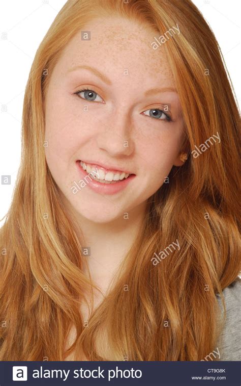 Smiling Face Of Pretty Red Haired Teenage Girl With