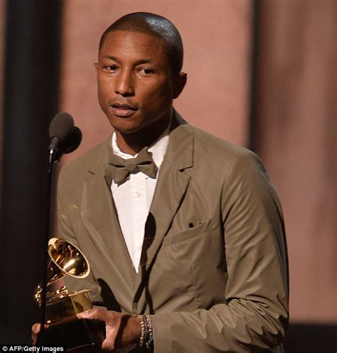 pharrell williams makes grammy michael brown gesture during happy performance daily mail online