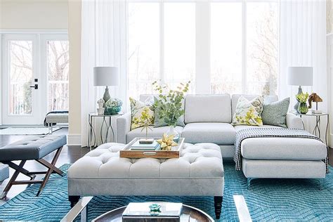 a light and bright living room splashed with oceanic hues