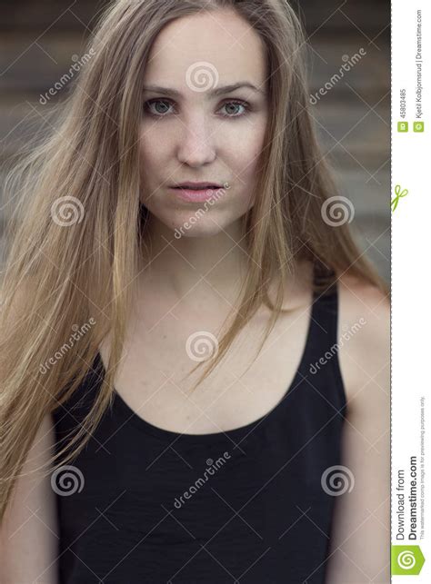 scandinavian fashion woman model posing outdoor stock