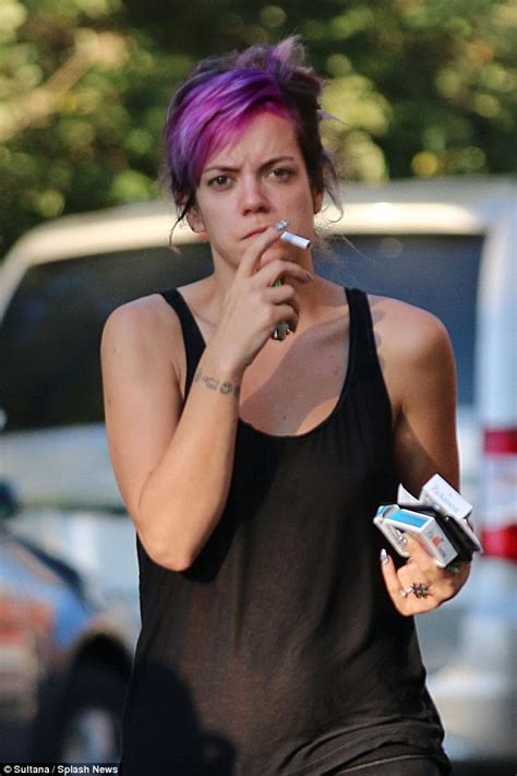 Lily Allen Dresses Down In Tracksuit Bottoms As She Smokes On A Quick