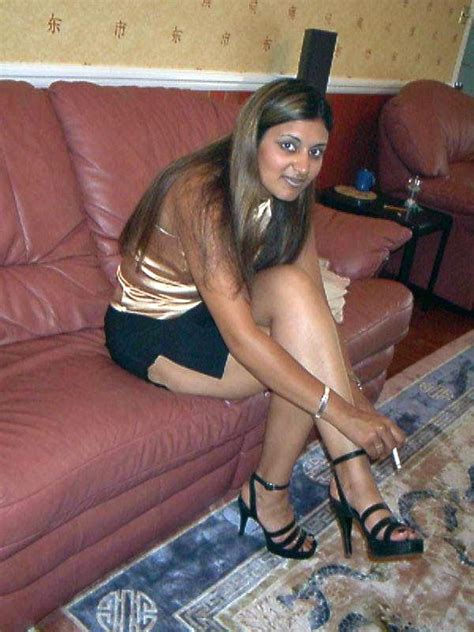 horny indian cutie taking off her miniskirt and black panties just to show her shaved twat