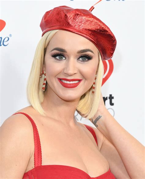 Busty Singer Katy Perry Showcasing Her Cleavage In A Red Dress