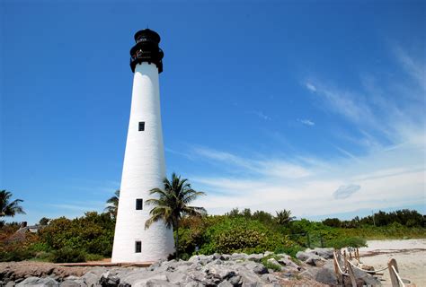 photo cape florida lighthouse beach clouds landscape   jooinn