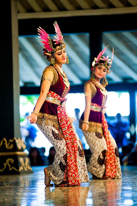 batik clothing indonesia two women performing a traditional javanese
