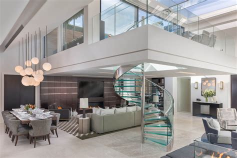 elegant contemporary mayfair penthouse  sleek glass spiral staircase idesignarch