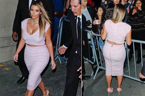 kim kardashian flashes her booty in pink as she reveals she will take
