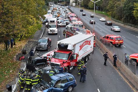ambulance flips  multi car crash  nycs prospect expressway
