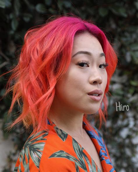 Undone Wavy Layered Bob With Curtain Bangs And Fiery Neon Ombre Color