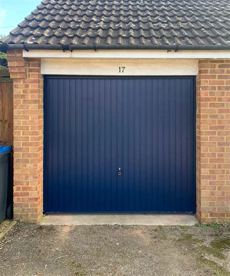 garador carlton vertically ribbed canopy   garage door finished  steel blue