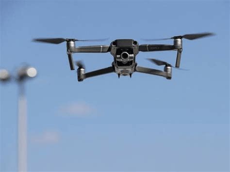 chinese  drones enforcing social distancing   raises concerns  spying video