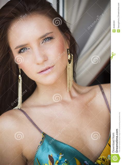 Beautiful Brunette Woman In Summer Dress On The Balcony Stock Image