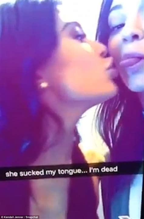 kendall jenner slips her tongue into kylie s mouth in snapchat video daily mail online