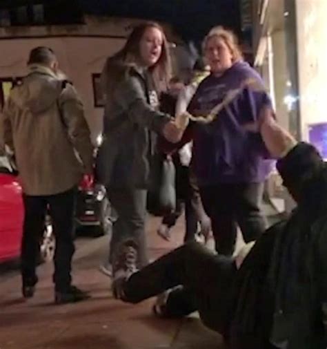 woman pours water on homeless man after watching him being attacked