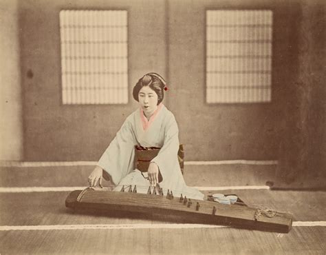[japanese woman playing a koto] getty museum