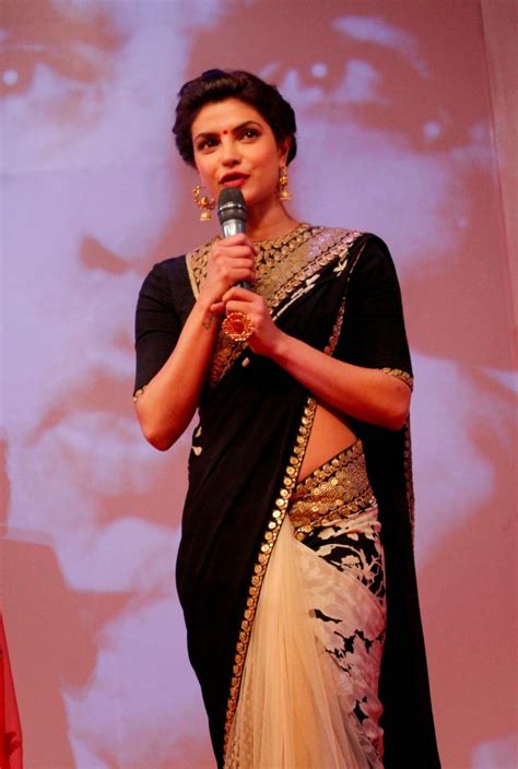 priyanka chopra looks hot in saree at the launch of dilip kumar s autobiography desifunblog