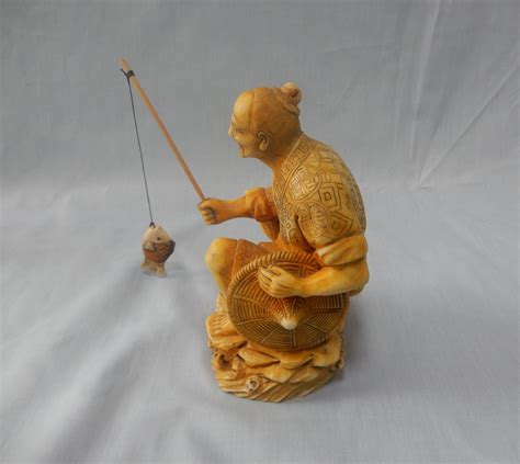 antique japanese resin netsuke fisherman fishing rod fish mid etsy