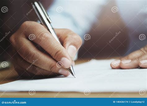 hand  woman holding   writing  paper report stock photo