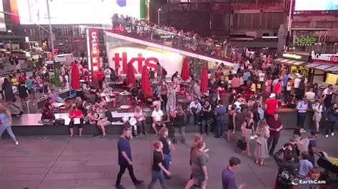mass panic in time square caused by a motorcycle backfire