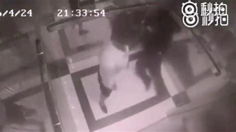 woman beats man up in elevator