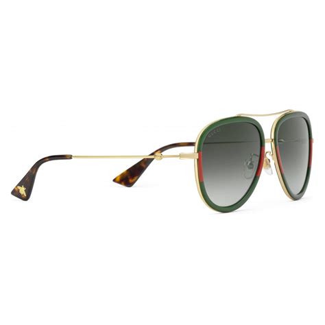 gucci aviator acetate sunglasses gold with green and red web frame