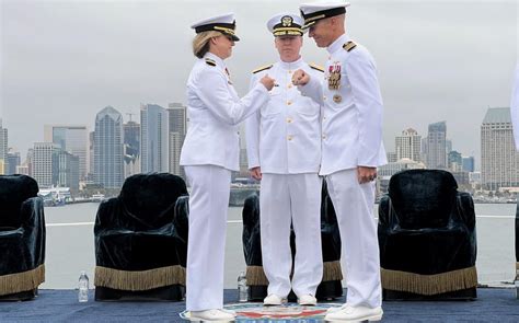 1st woman to lead aircraft carrier completes command tour stars and