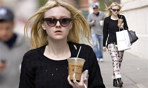 Dakota Fanning Steps Out In Designer Trousers That Reached Height Of