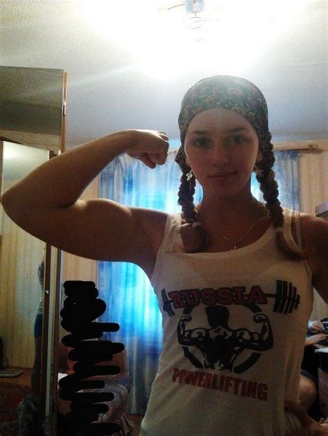russian girl has a doll like face but physique of a body builder