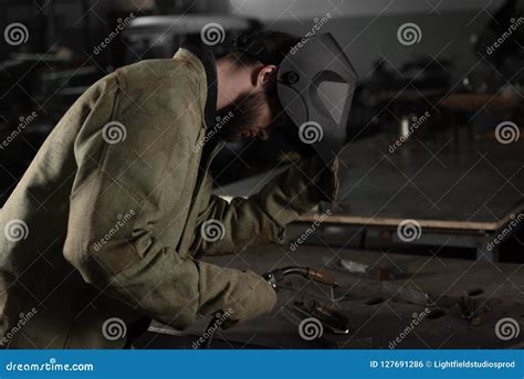 welder lifting  protective mask     work stock photo image  craftsman