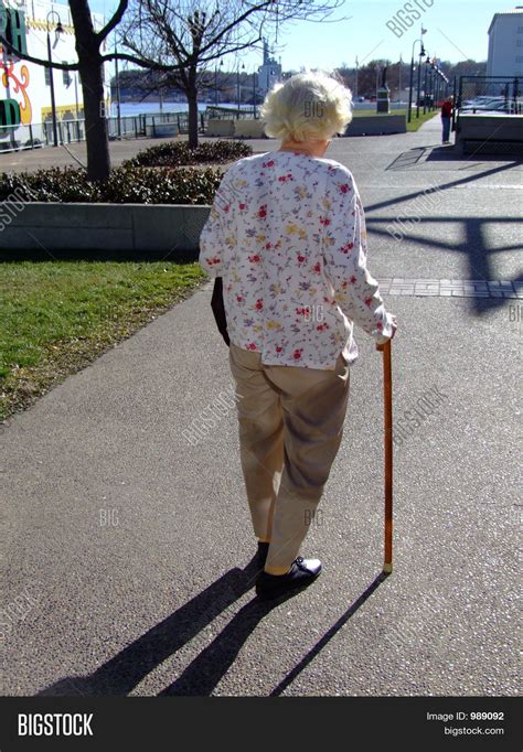 senior woman cane image photo  trial bigstock