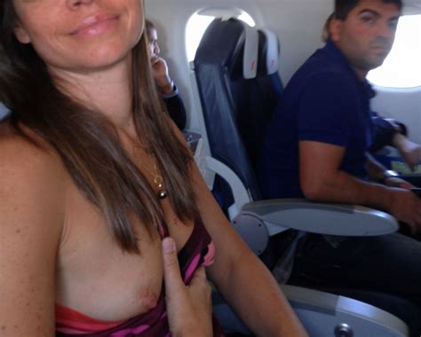 wife flashing tits on plane